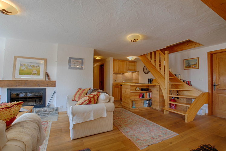 appartement-sologne-132-237-verbier-salon-cheminee-05.jpg