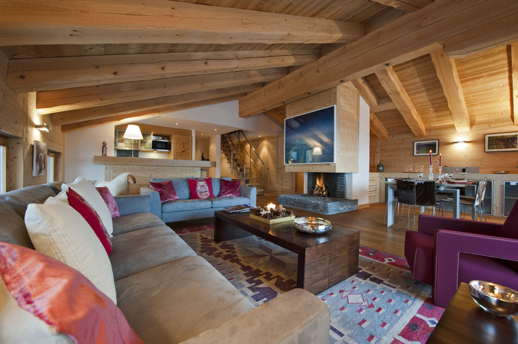 appartement-airview-203-verbier-salon-cheminee-04.jpg