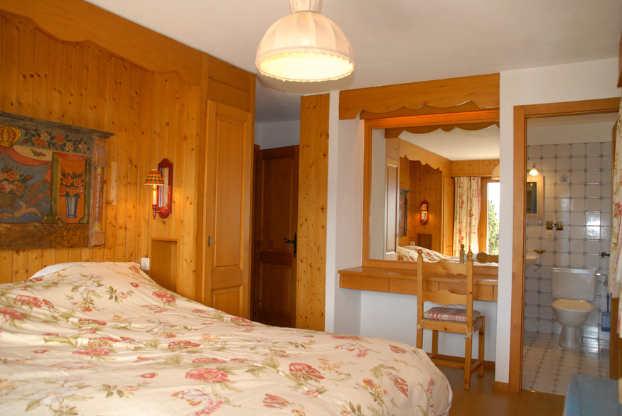 appartement-flaminia-014-verbier-chambre-lit-double-09.jpg