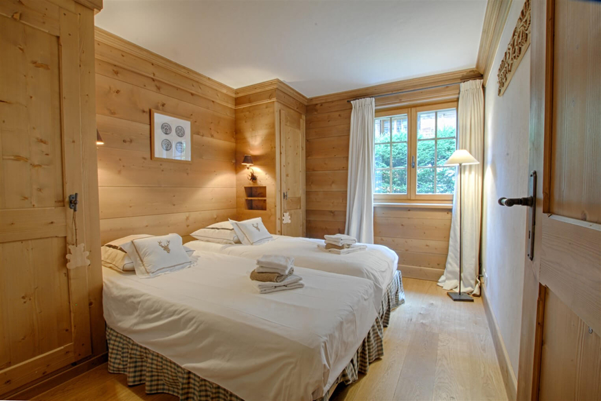 appartement-coprin-009-verbier-chambre-double-lit-09.jpg