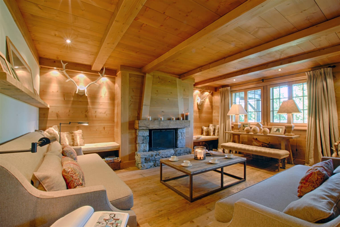 appartement-coprin-009-verbier-salon-cheminee-vue-2-02.jpg