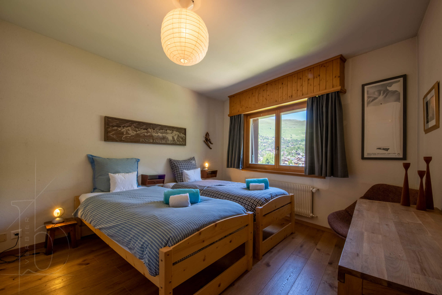 appartement-girolles-a64-verbier-chambre-lits-jumeaux-12.jpg