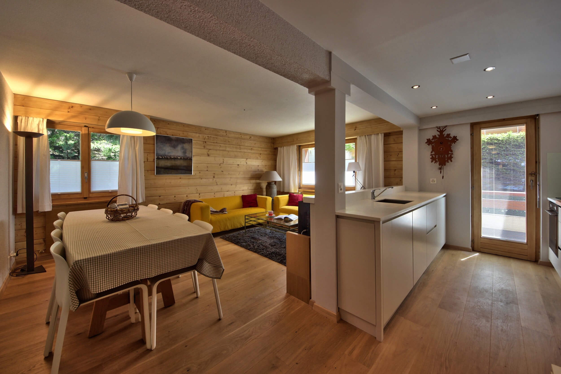 appartement-flaminia-012-verbier-sejour-ouvert-cuisine-03.jpg
