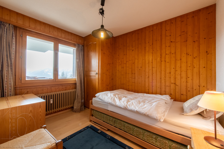 appartement-boucanier-103-verbier-chambre-cosy-boiseries-04.jpg