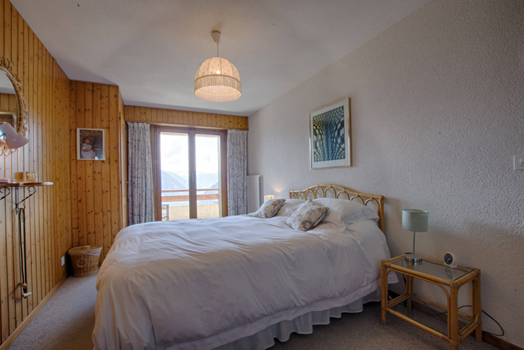 appartement-flaminia-117-verbier-chambre-lumineuse-06.jpg