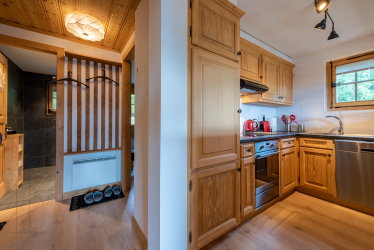 appartement-verseau-17-verbier-cuisine-vue-entree-04.jpg