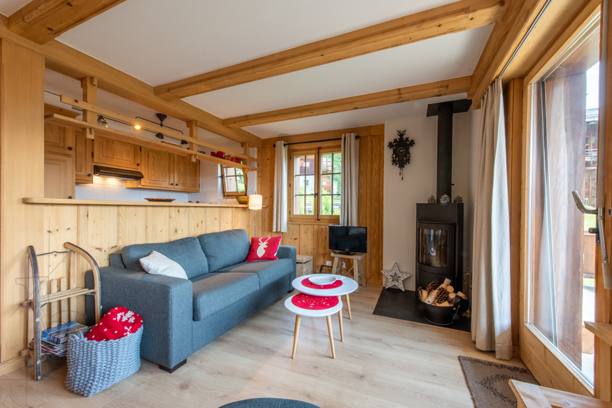 appartement-verseau-17-verbier-salon-canape-poele-02.jpg