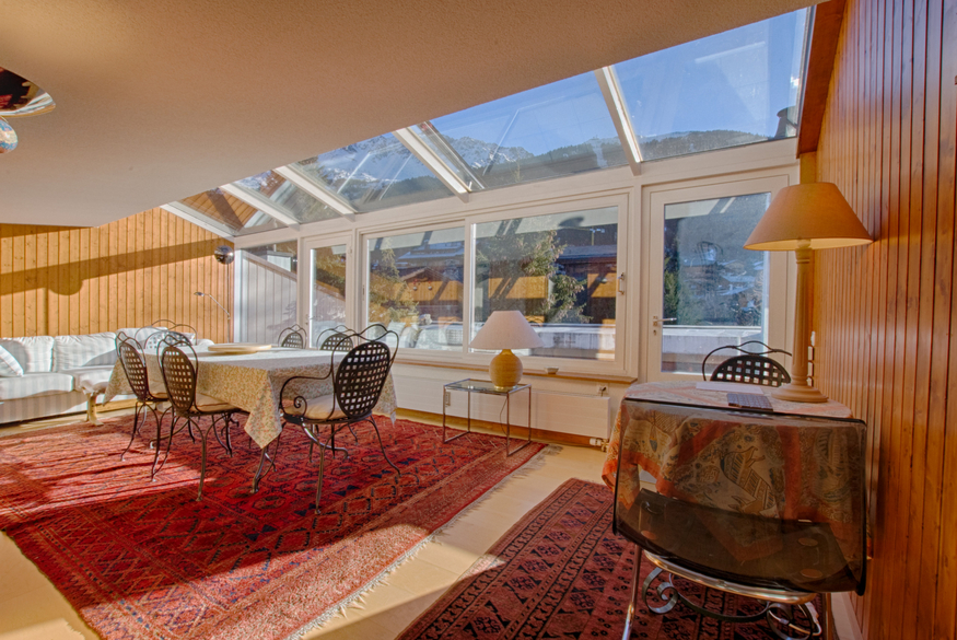 appartement-les-seracs-44-verbier-veranda-salle-a-manger-11.jpg