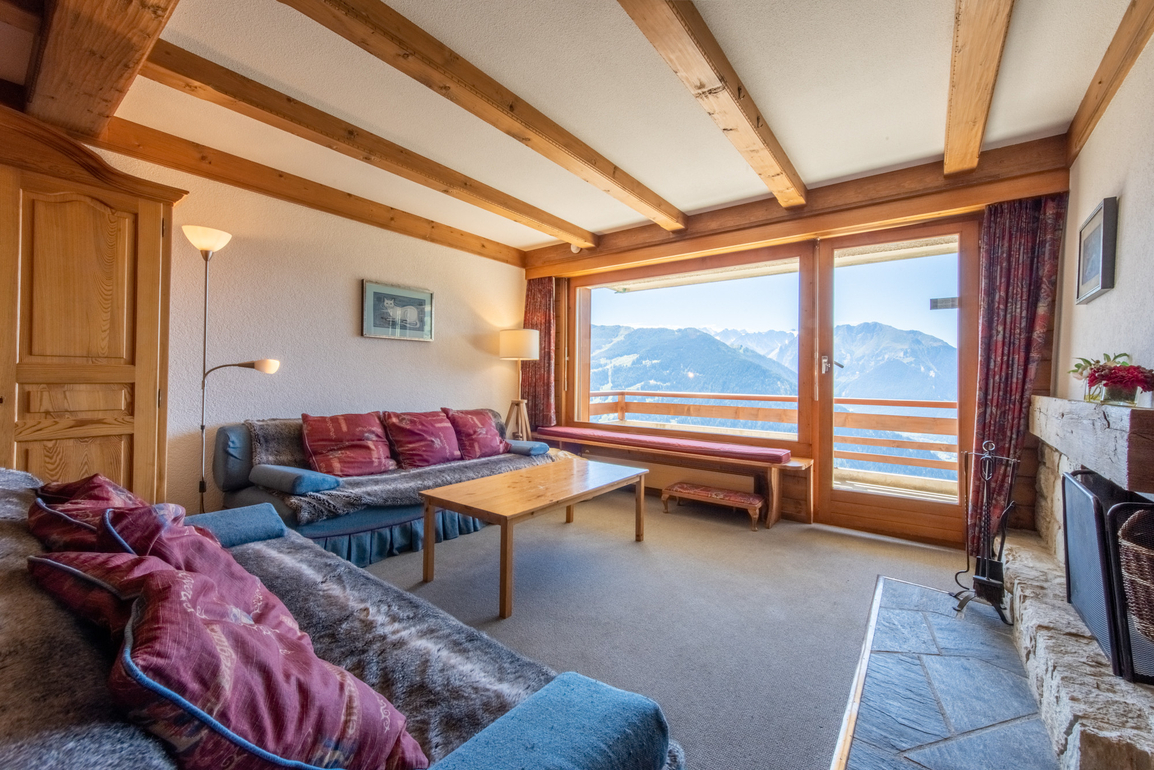 appartement-flaminia-221-verbier-salon-lumineux-01.jpg