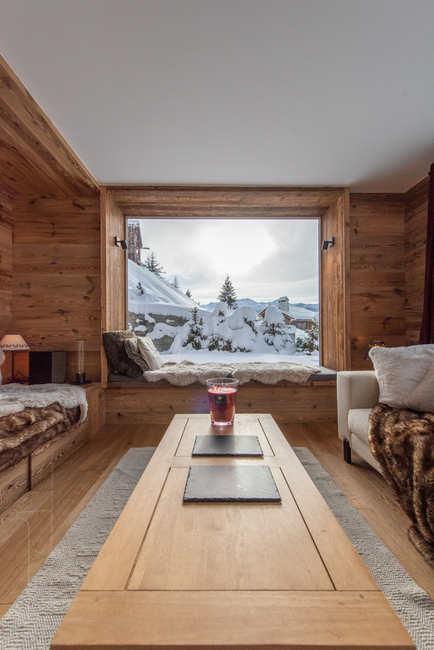 appartement-grand-cirque-verbier-coin-salon-vue-fenetres-07.jpg