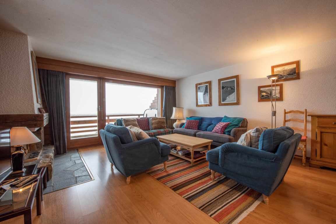 appartement-flaminia-118-verbier-salon-cosy-03.jpg