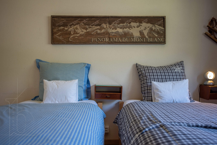 appartement-girolles-a64-verbier-chambre-lits-jumeaux-vue-2-17.jpg