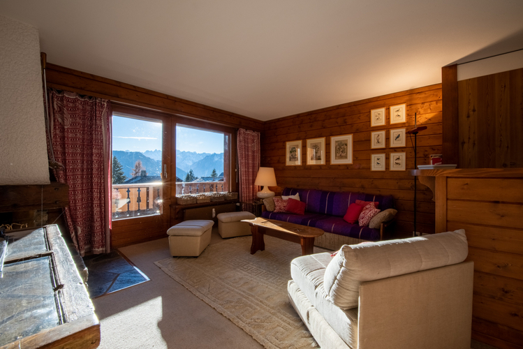 appartement-preles-120-verbier-salon-canape-violet-04.jpg