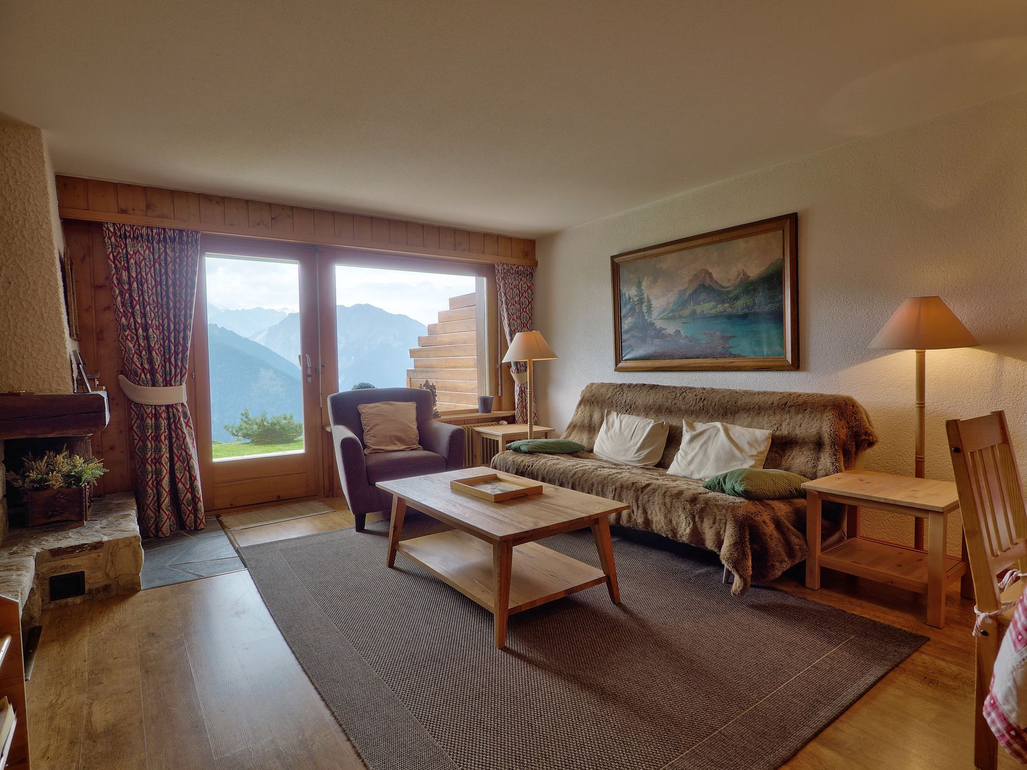 appartement-pelican-049-verbier-salon-lumineux-vue-01.jpg