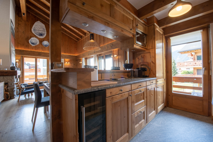 appartement-madelia-221-verbier-cuisine-coin-repas-06.jpg