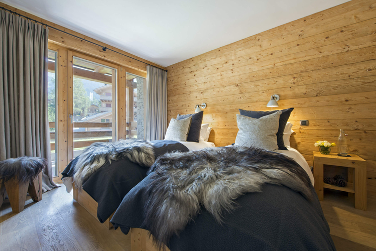 appartement-victoria-111-verbier-chambre-double-ambiance-cosy-04.jpg