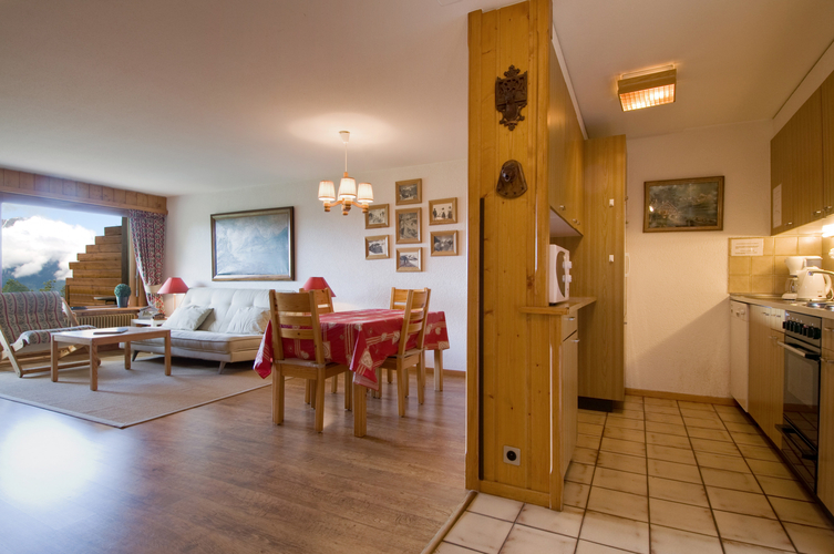appartement-pelican-049-verbier-cuisine-ouverte-espace-repas-04.jpg