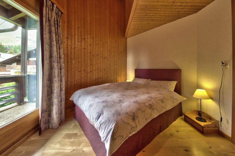 appartement-andrea-259-verbier-chambre-lit-double-06.jpg