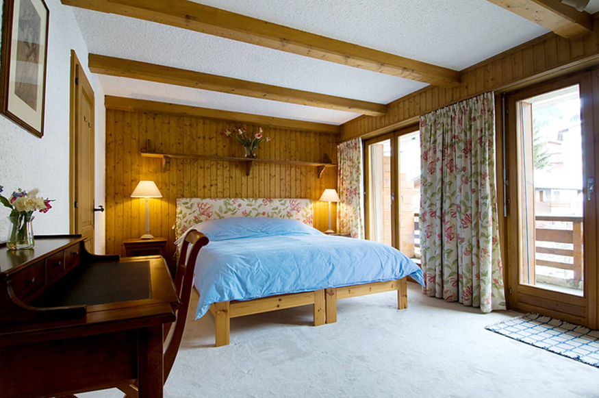 appartement-flaminia-432-verbier-chambre-chaleureuse-12.jpg