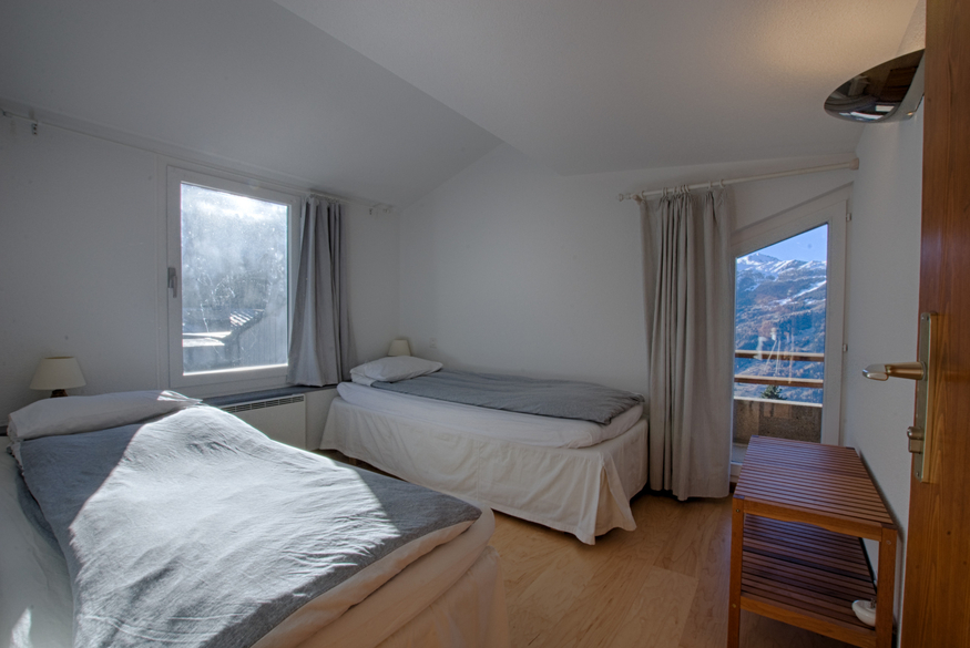 appartement-les-seracs-44-verbier-chambre-lits-simples-17.jpg