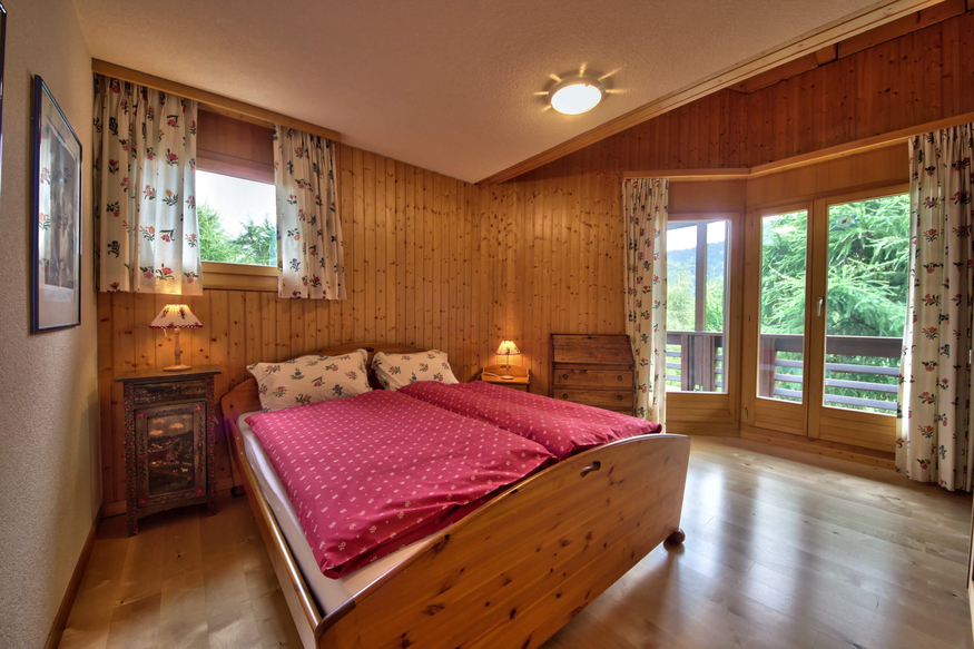 appartement-andrea-259-verbier-chambre-lumineuse-07.jpg